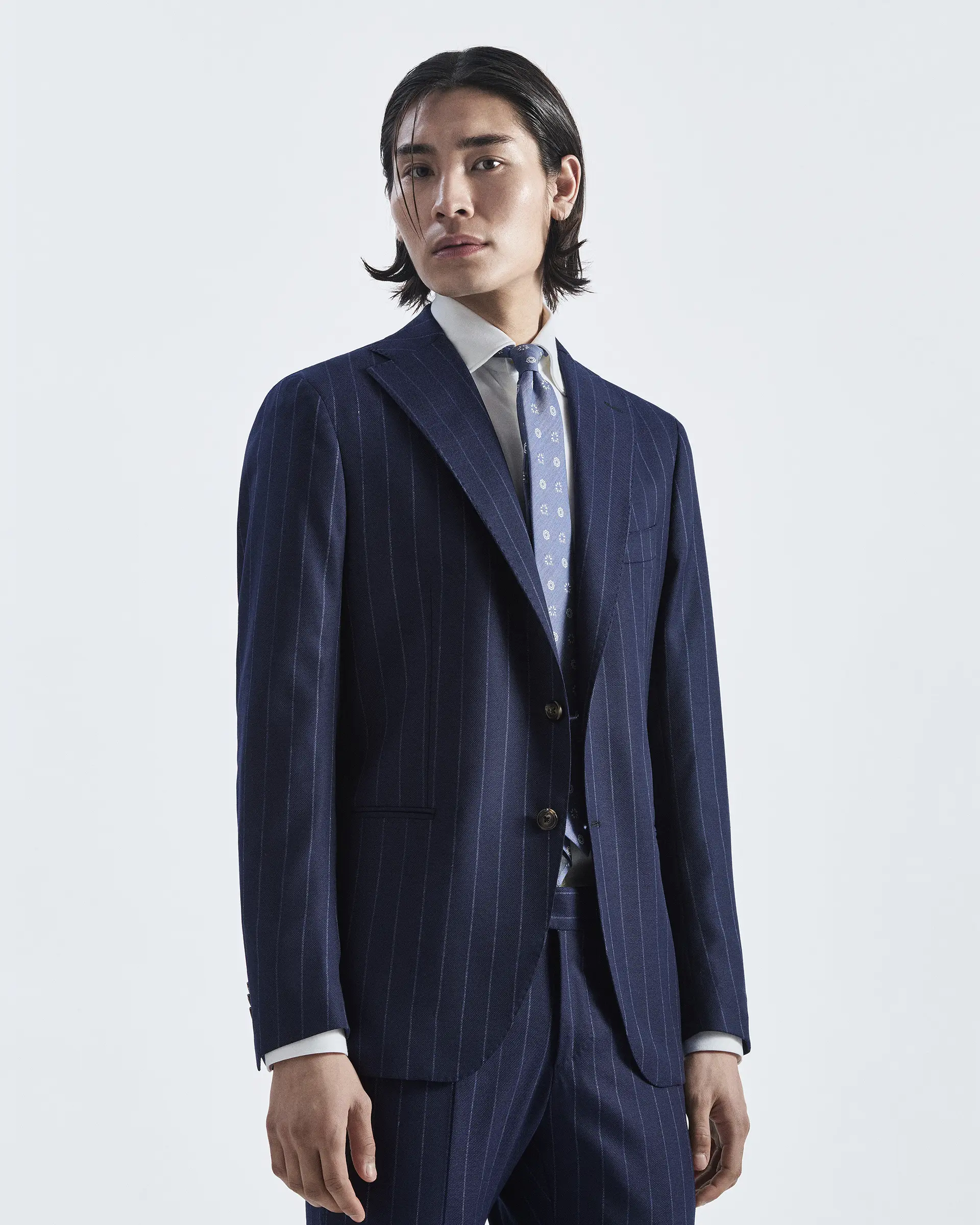 Blue loose-fitting pinstripe suit in stretch wool in Reda Flexo fabric