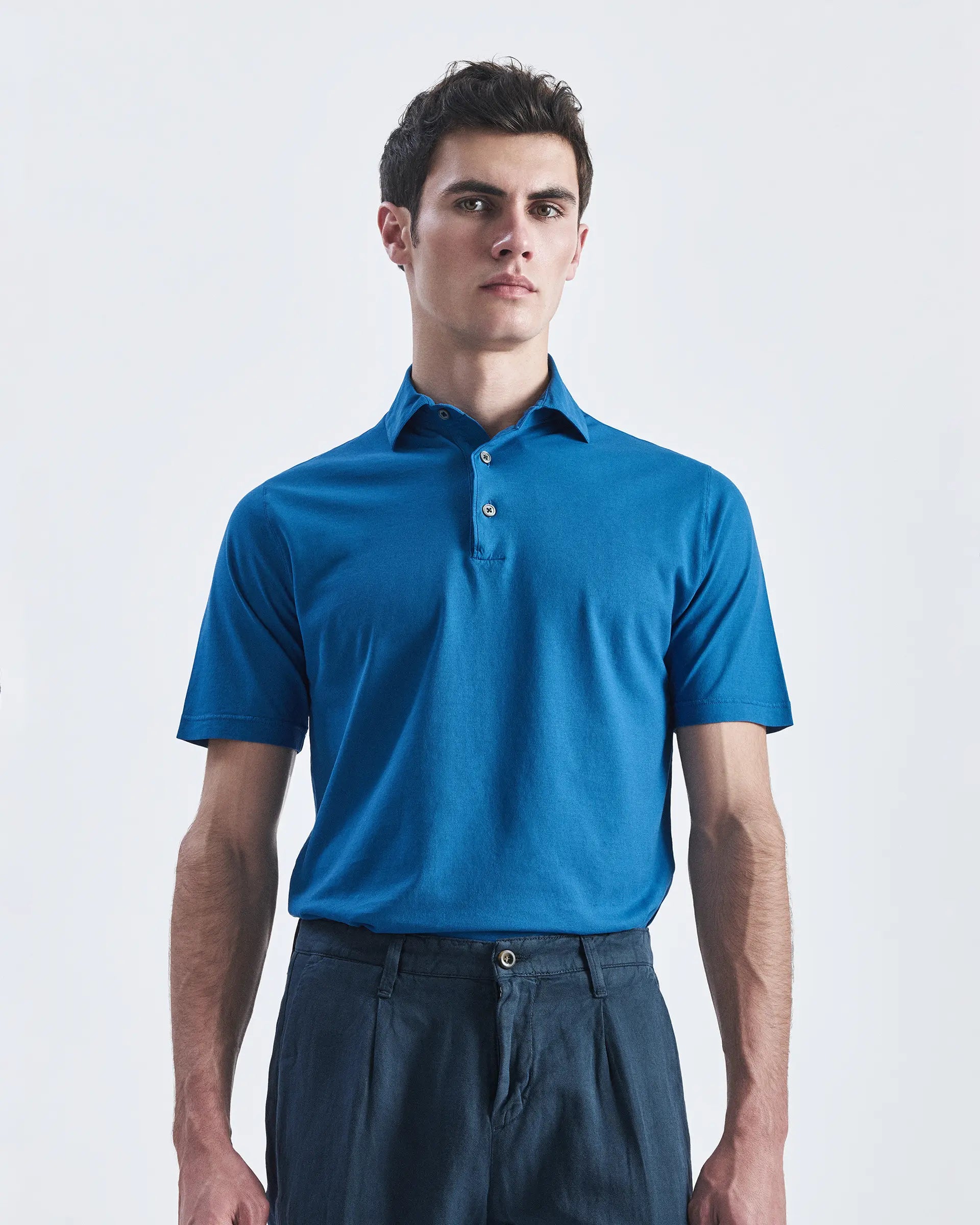 Light blue short sleeve polo shirt in pure crepe cotton