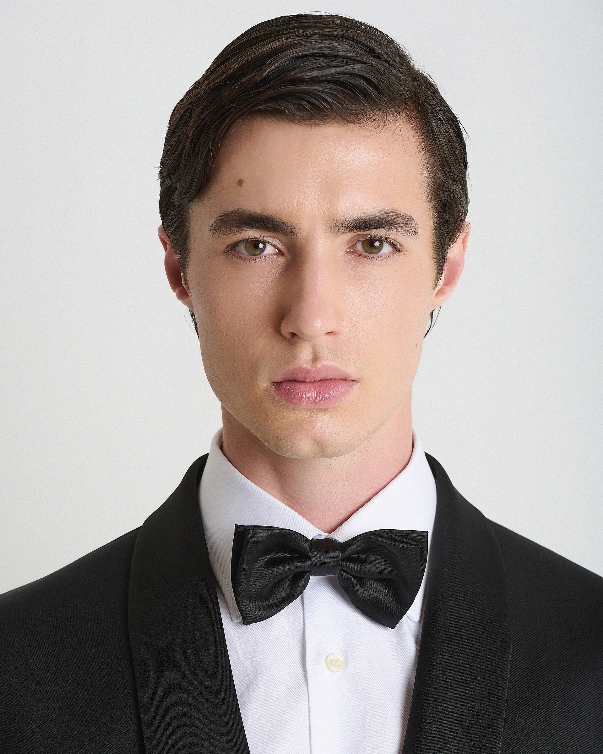 Smoking Nero con rever di raso sciallato di raso