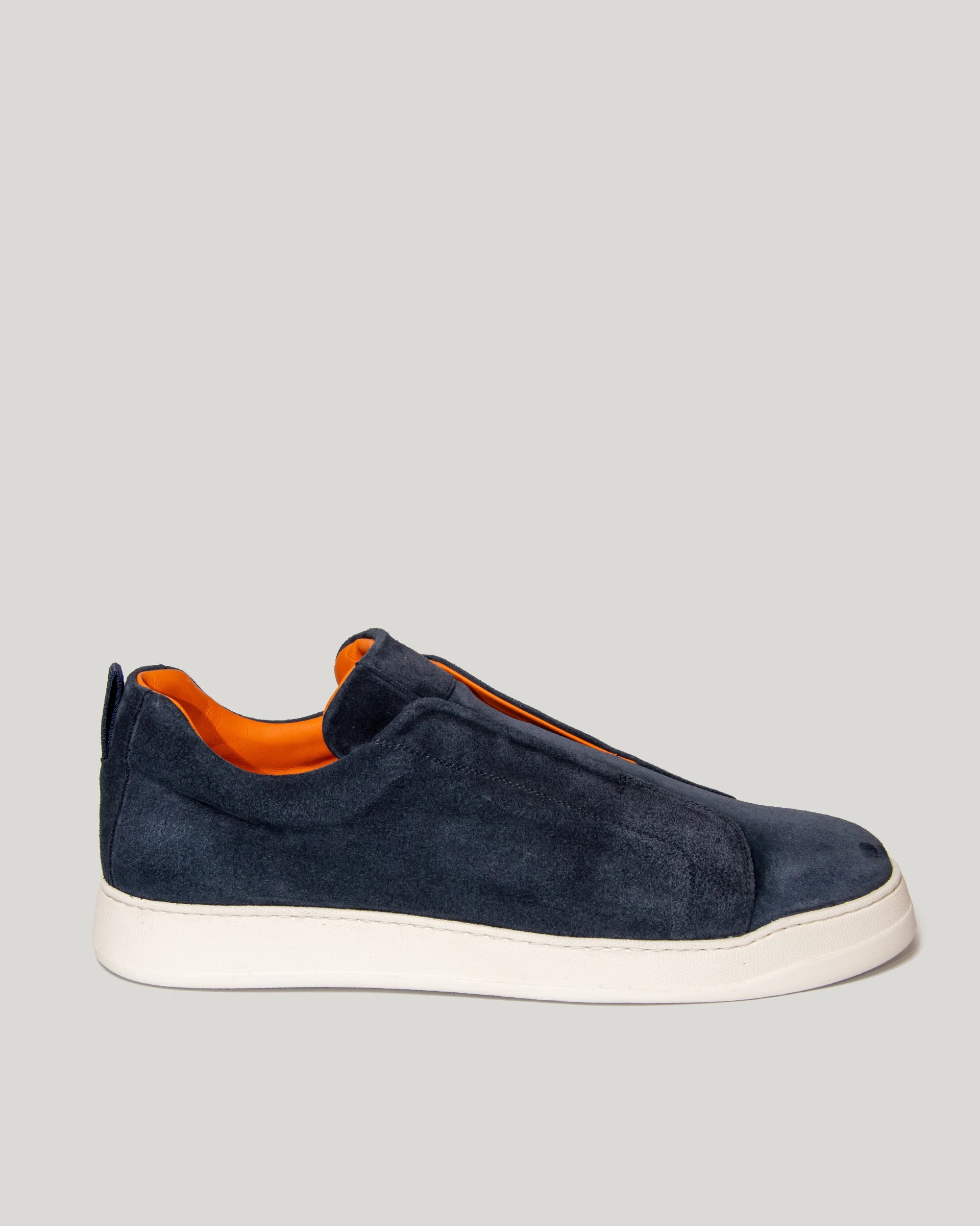 Unlined light blue suede slip-on sneakers