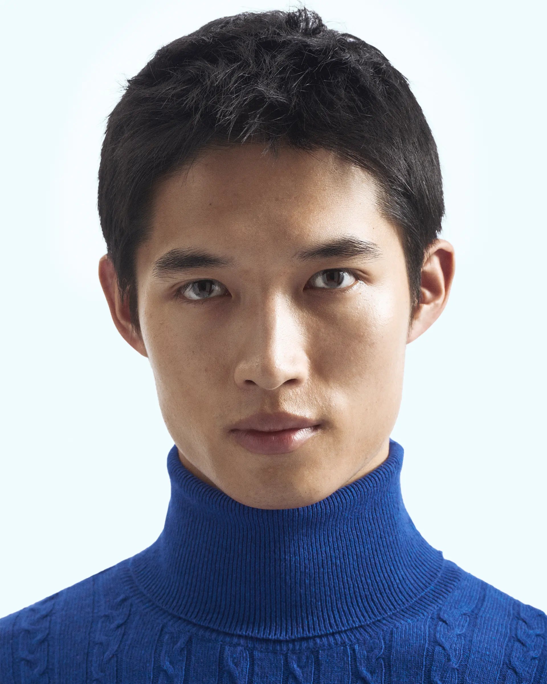 Blue cashmere blend turtleneck with braided workmanship