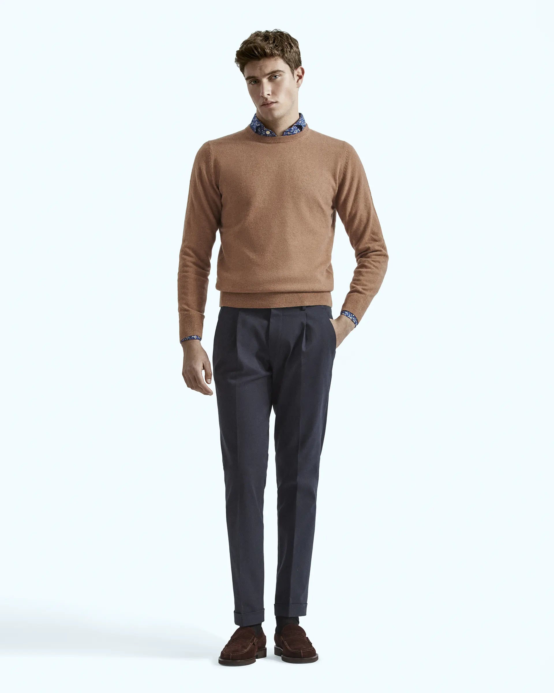 Grey trousers in stretch gabardine with pleats and side button placket