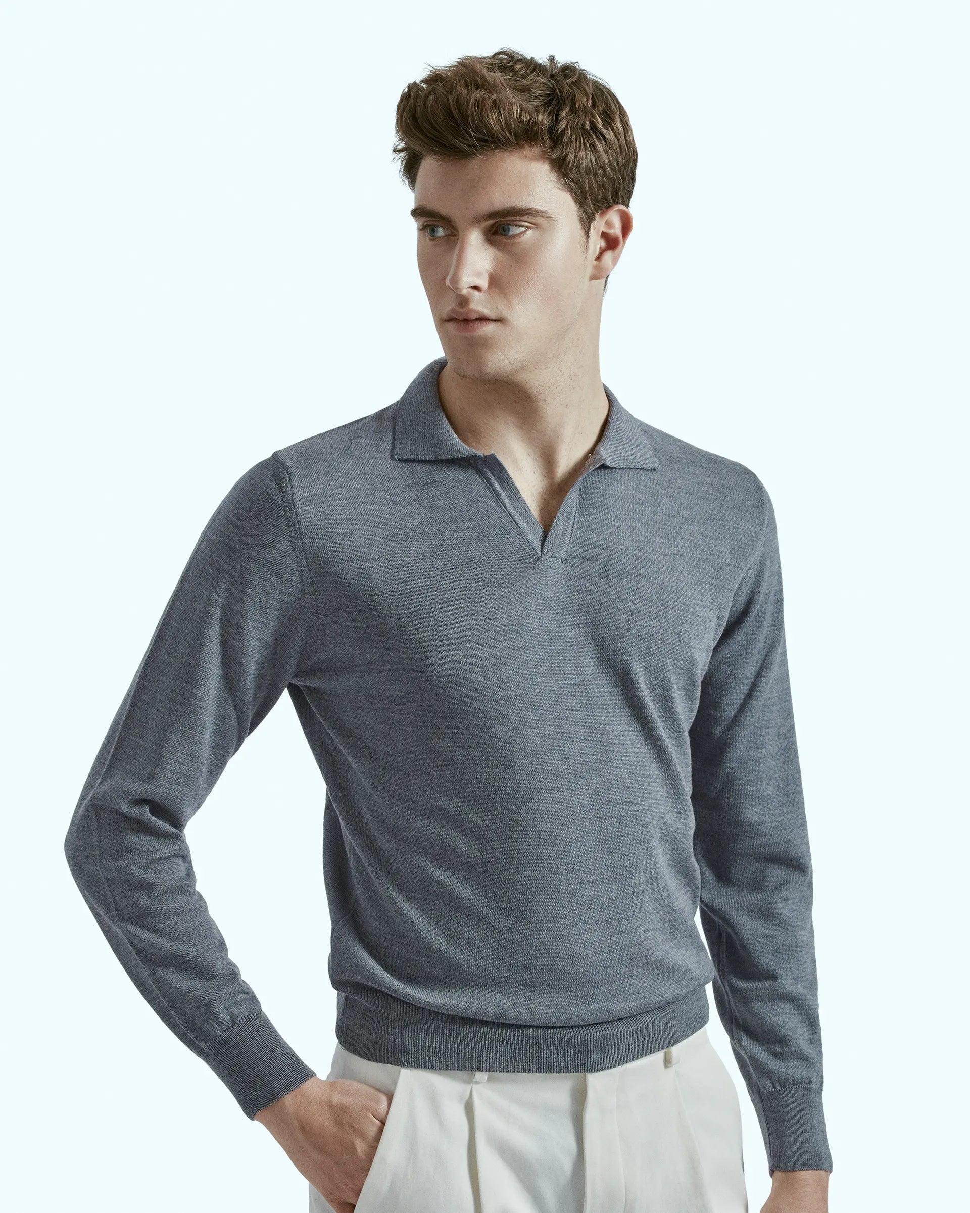 Polo senza bottoni grigio in pura lana merino extrafine