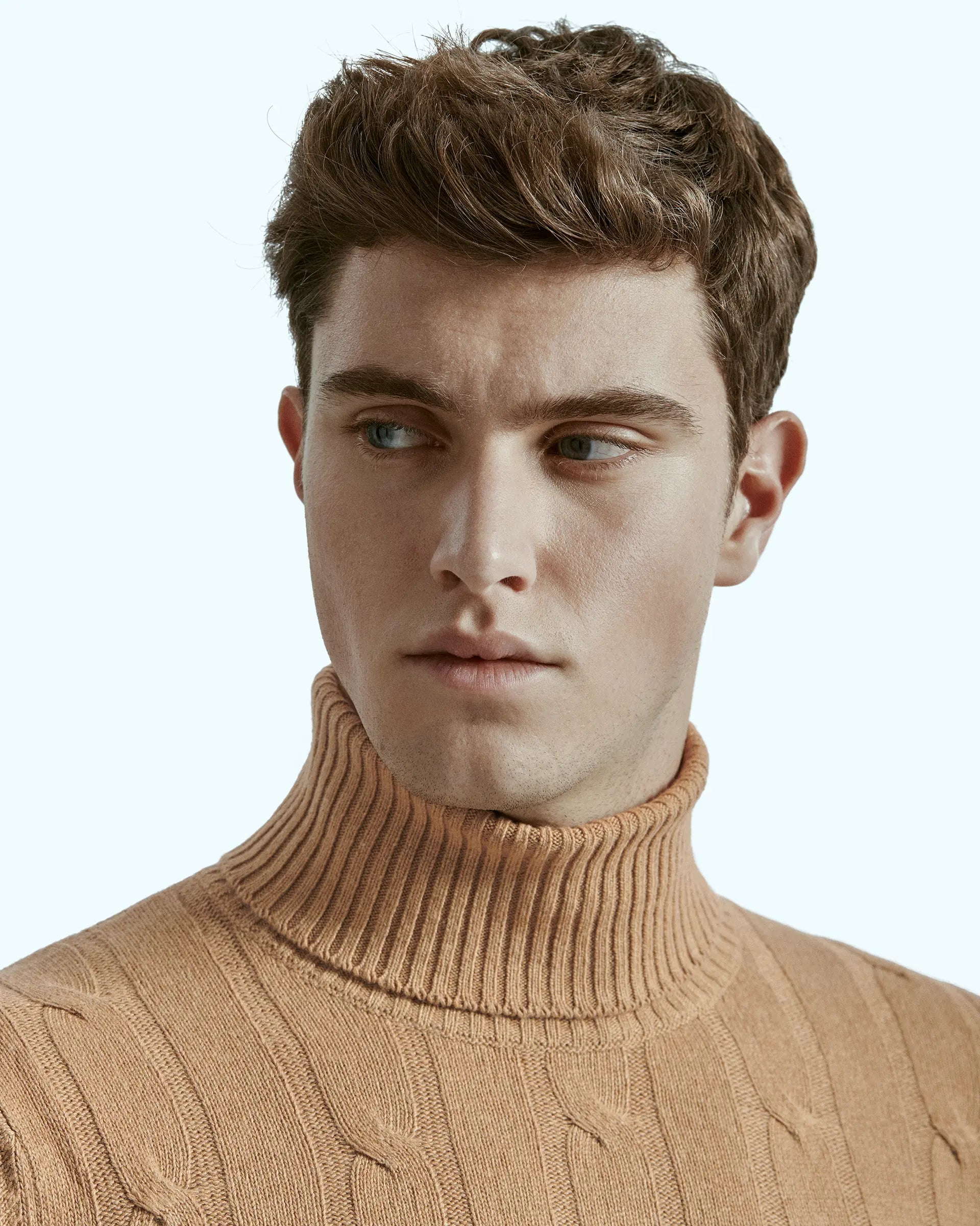 Camel turtleneck in cashmere blend with braided workmanship