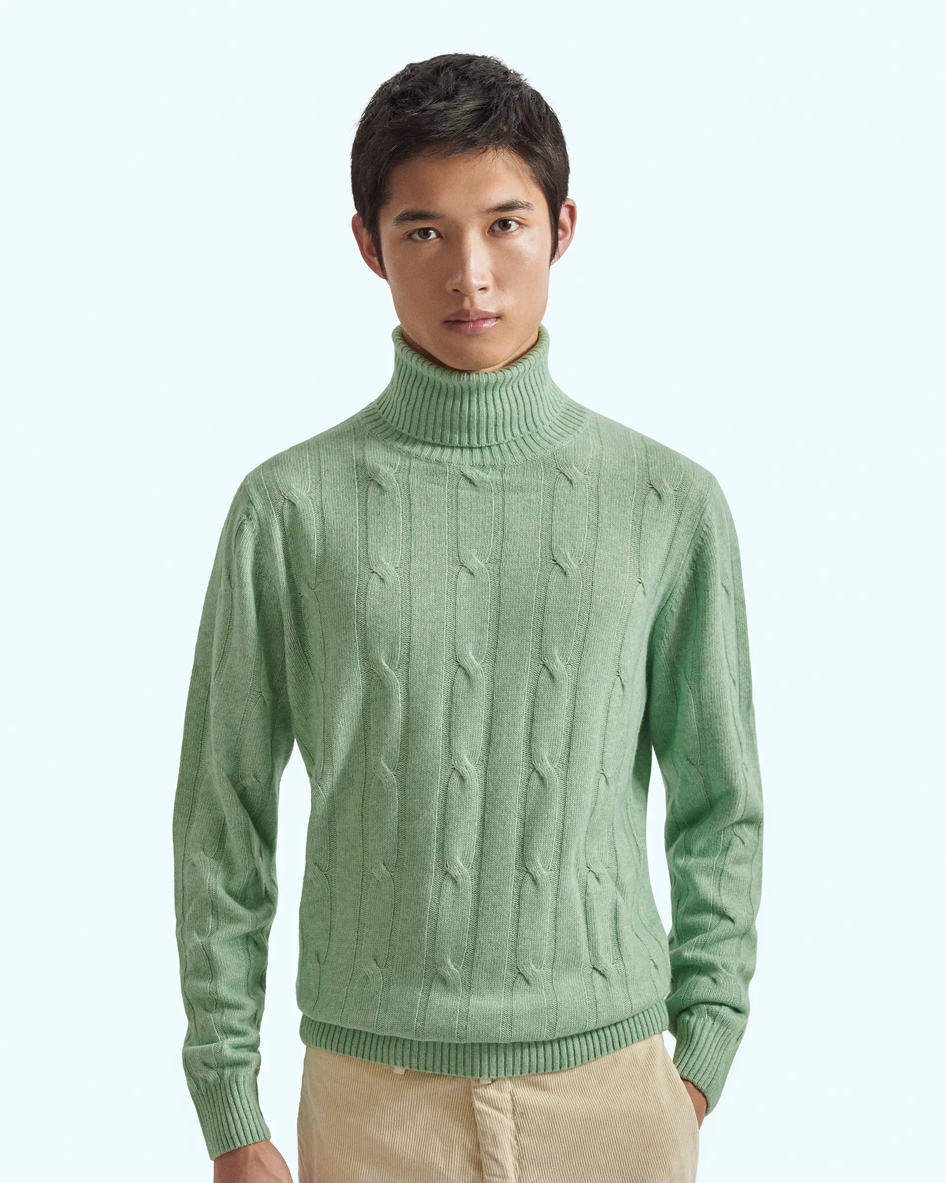 Green turtleneck in cashmere blend with cable knit