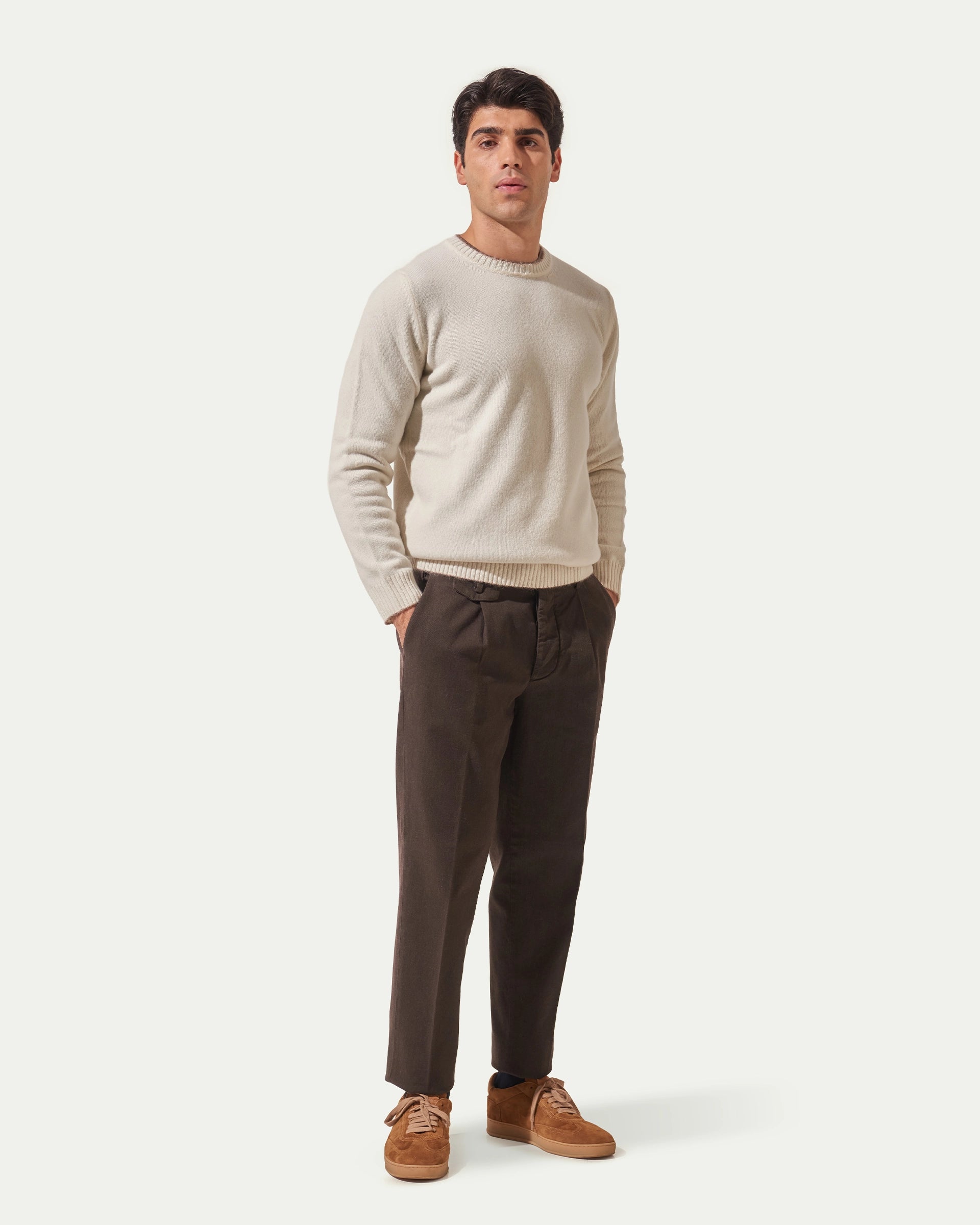 Brown Carrot trousers in stretch cotton with pleats and button placket