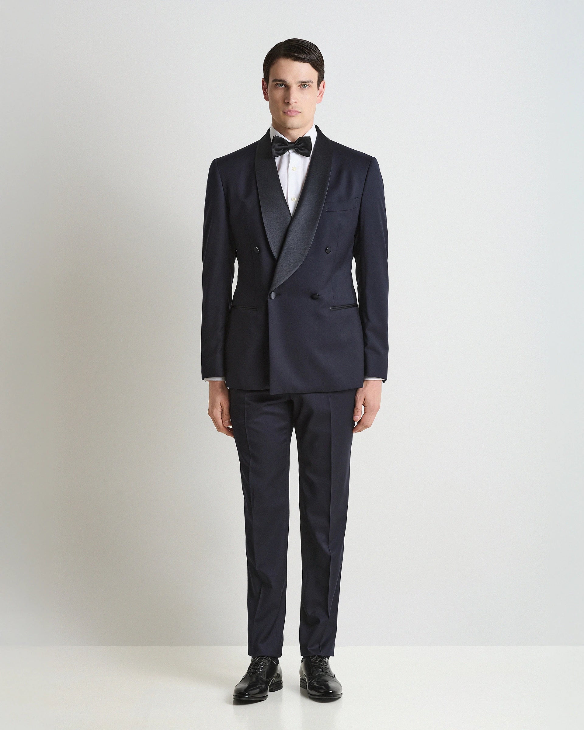 Smoking Blu Doppiopetto Blu con rever di raso