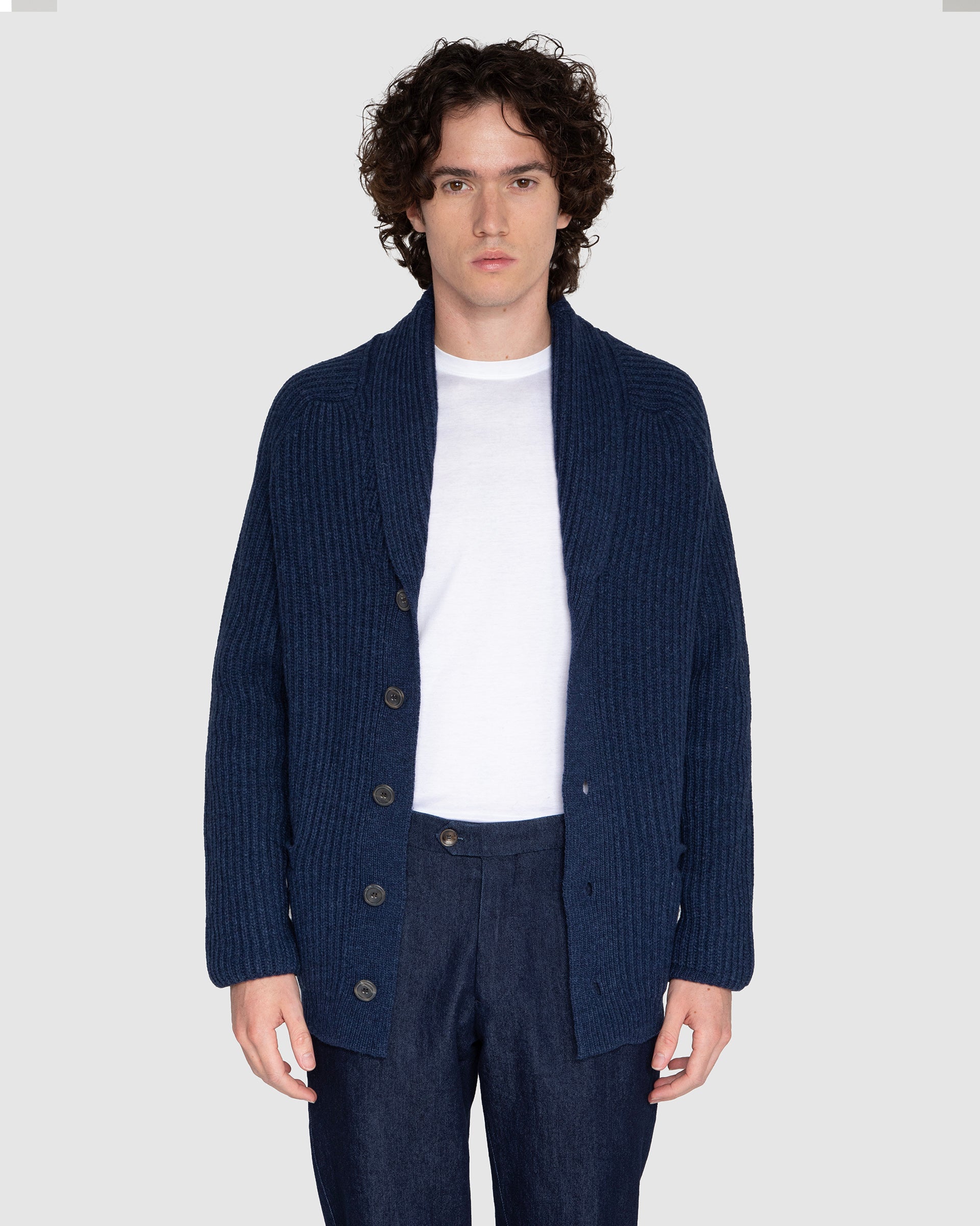 Giacca in maglia blu con collo sciallato